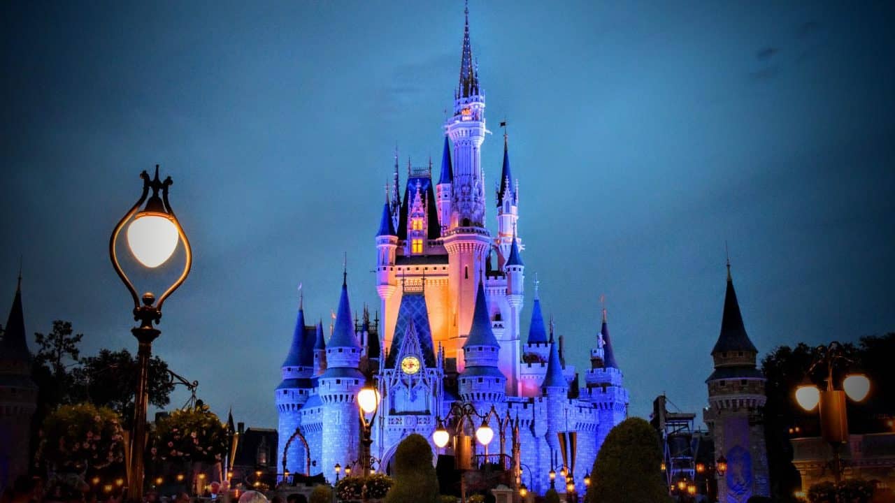 Cinderella Castle lit up at night before Happily Ever After.