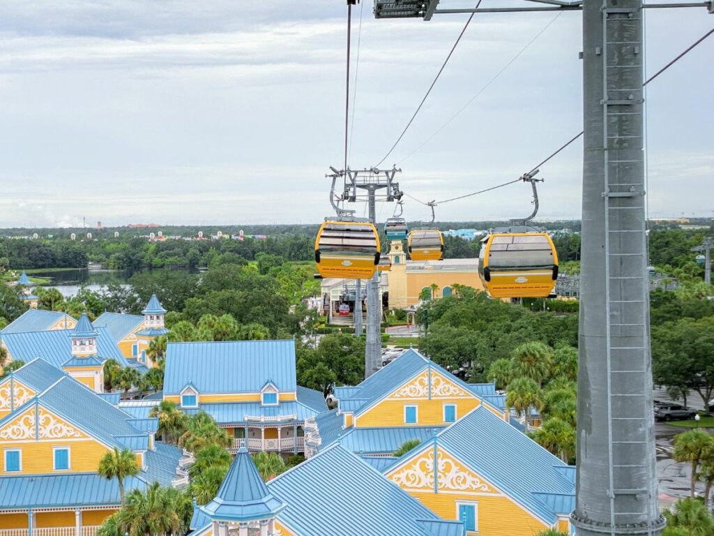 Disney Skyliner soaring over Disney's Caribbean Beach Resort