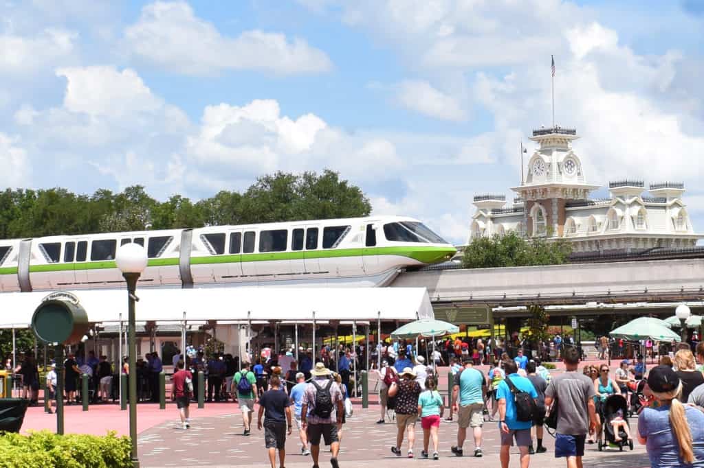 Monorail Lime passes the entrance of Magic Kingdom
