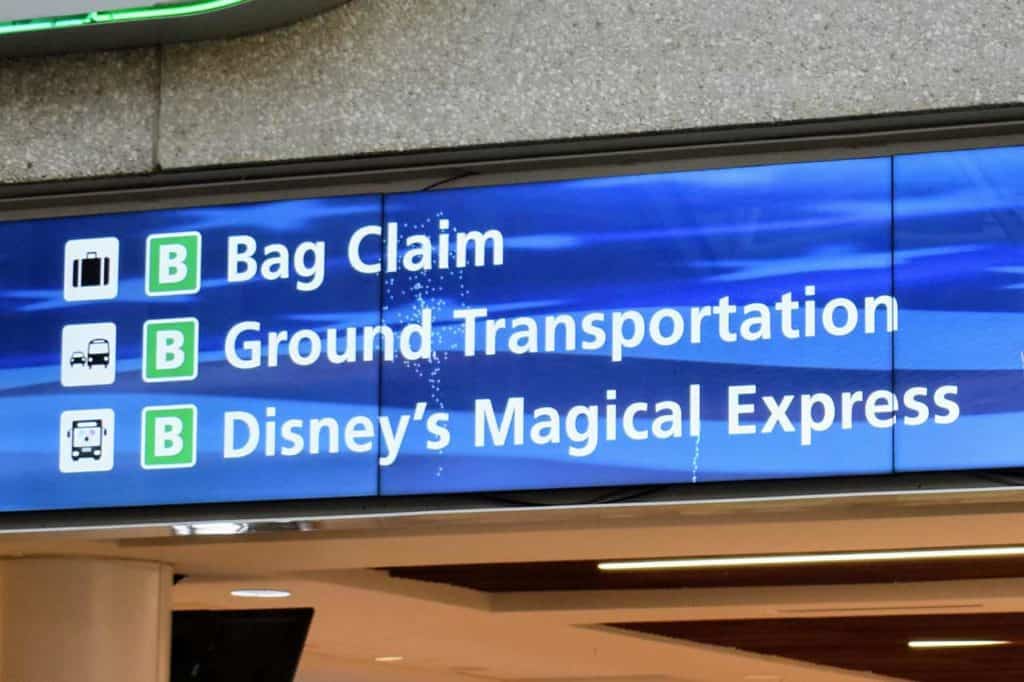 Orlando International Airport concourse sign for Disney's Magical Express.