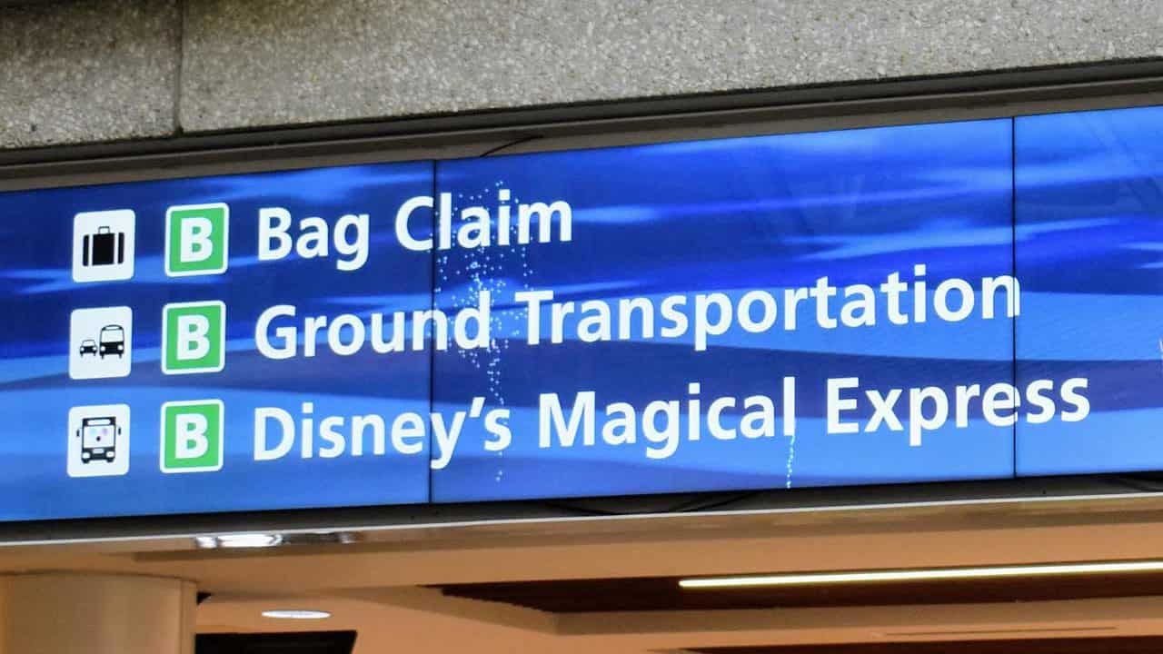 Orlando International Airport concourse sign for Disney's Magical Express.