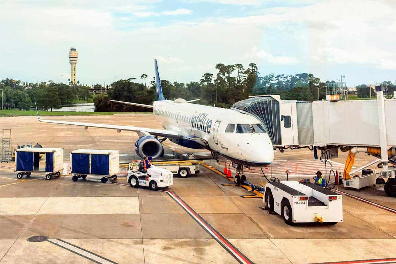 Take Disney's Magical Express from Orlando International Airport.