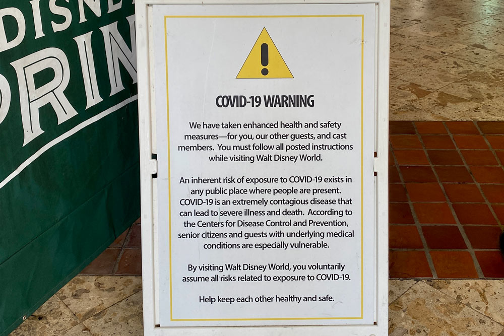 Covid 19 warning sign at Disney World