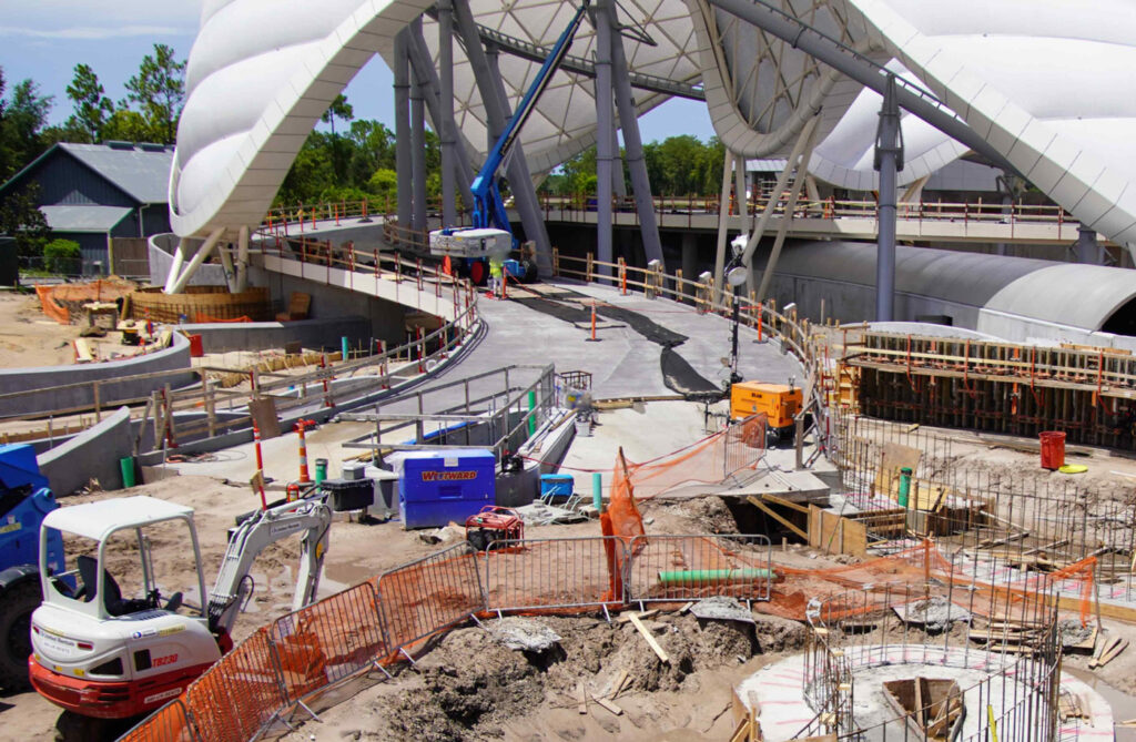 Photo of the first walkway pavement poured on TRON Lightcycle / Run.